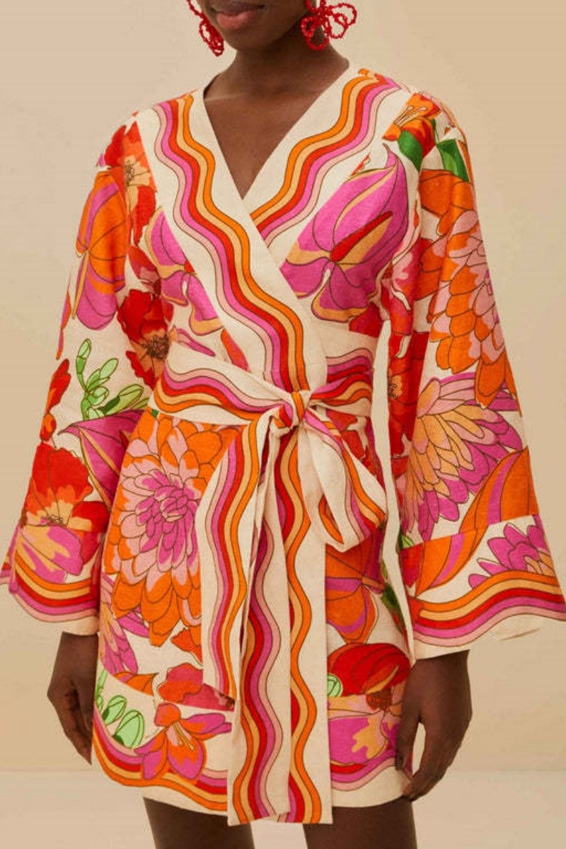 Three-quarter view showing wave hem detail and colorful pattern