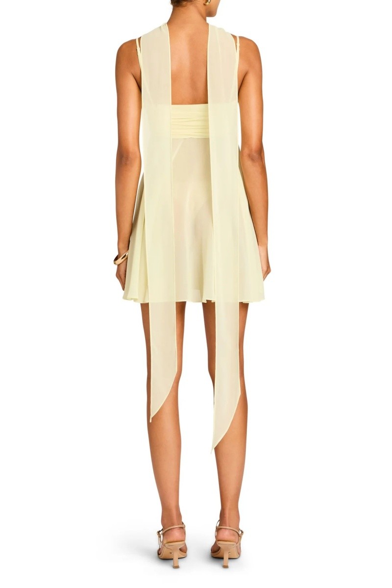 Flat lay of yellow chiffon mini dress with matching scarf tie