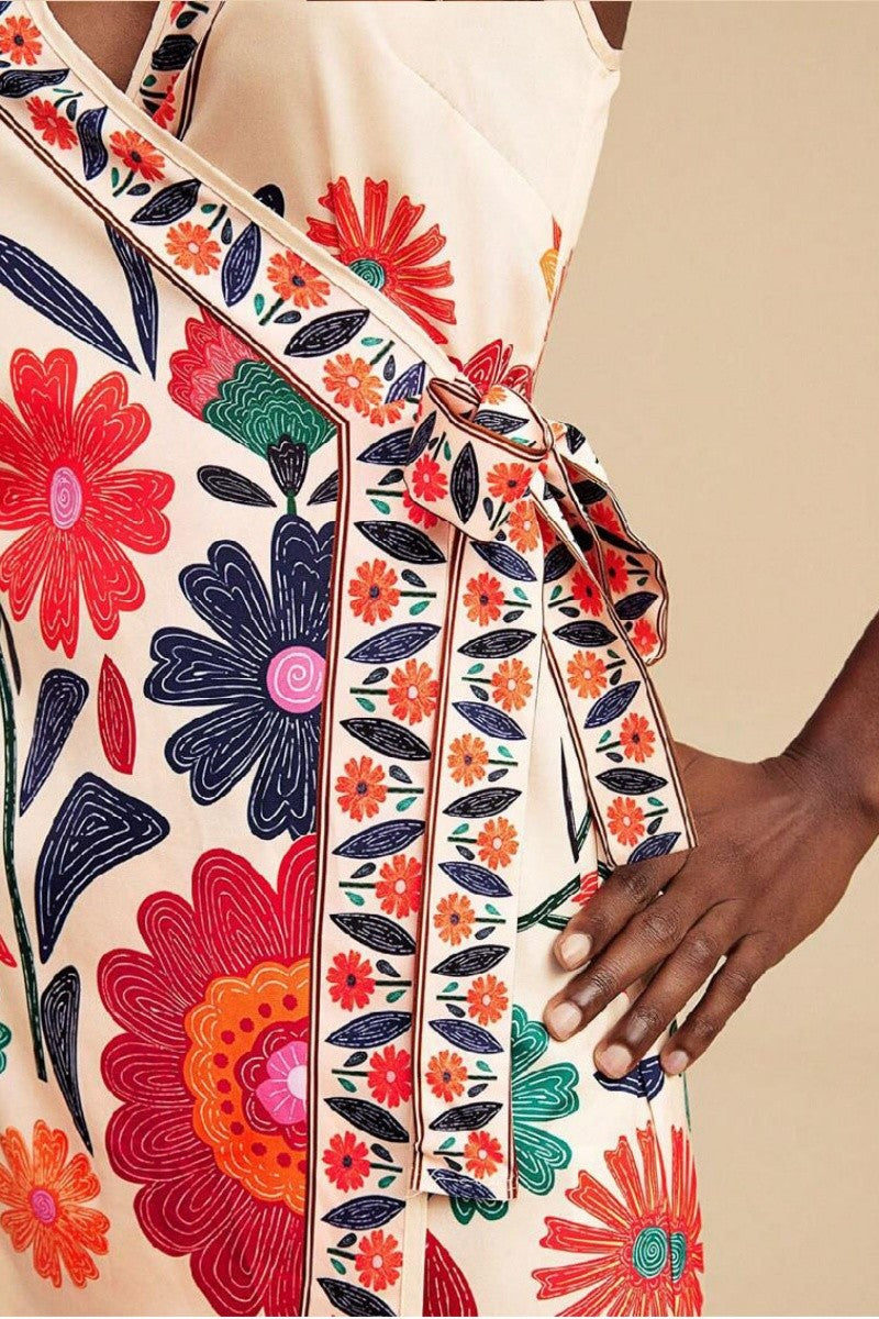 Side view of hemline and colorful floral border embroidery