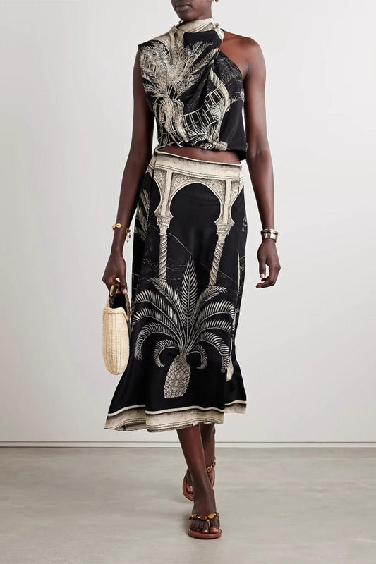 Full front view of model walking in the Marrakesh Muse set, featuring asymmetrical cami and printed midi skirt.